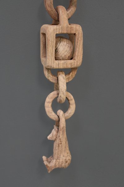 Lower Components of Wooden Chain After 
		First Sanding