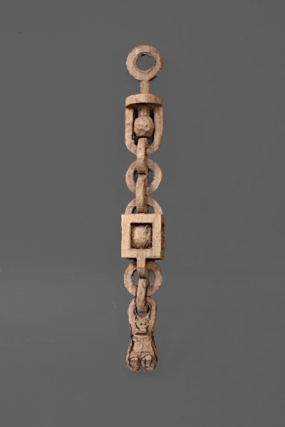 Roughed Out Components of Chain With Centers 
		Carved Out