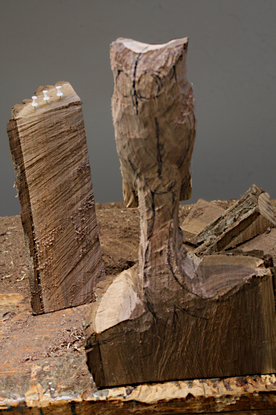 Blocked out owl sculpture with corners rounded off.